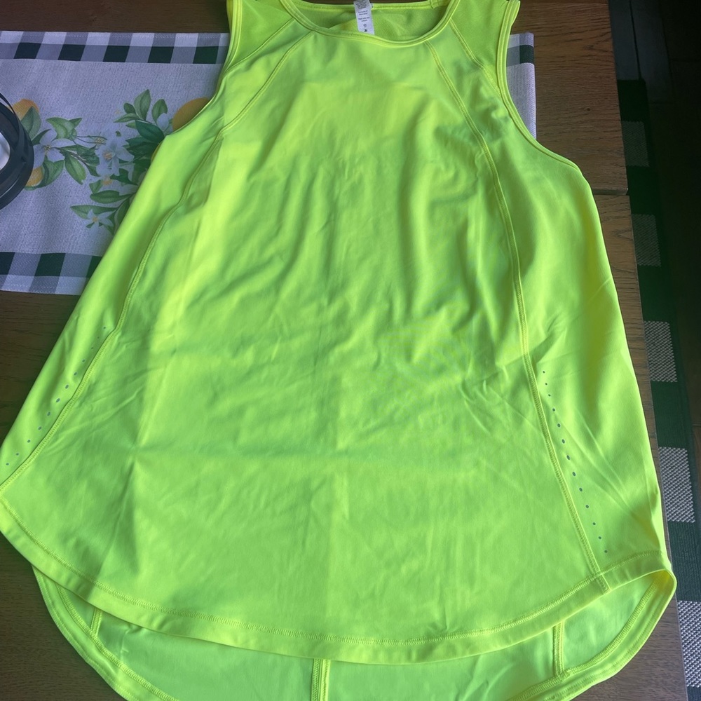 Lululemon sculpt tank size 10 fluorescent yellow. NEVER worn.